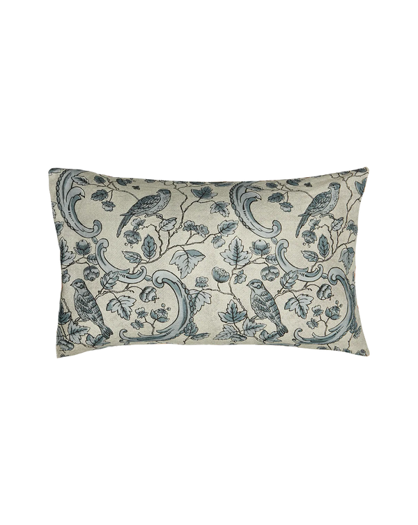 A rectangular lumbar throw pillow featuring a classic toile de Jouy pattern with blue birds, leaves, and scrollwork on a warm cream background. Callista Home 