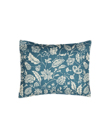 A square decorative throw pillow featuring a classic floral and botanical pattern in teal blue and cream, set against a plain white background. callista Home
