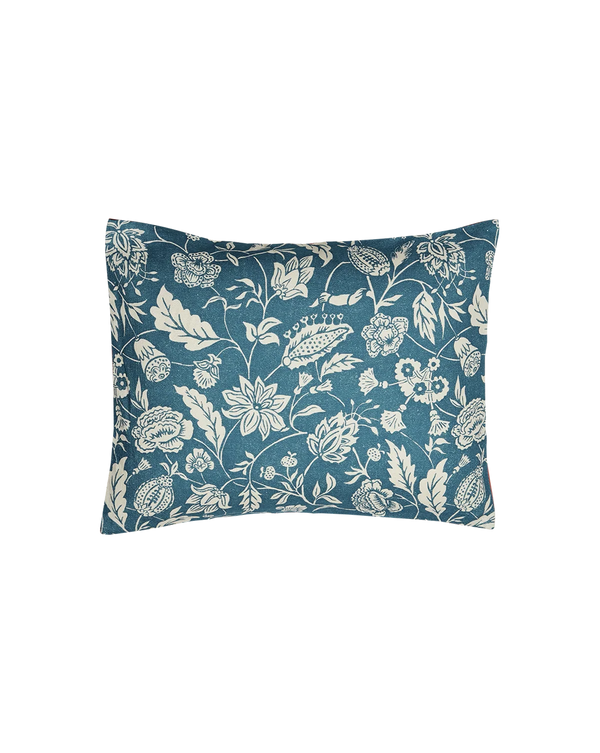 A square decorative throw pillow featuring a classic floral and botanical pattern in teal blue and cream, set against a plain white background. callista Home