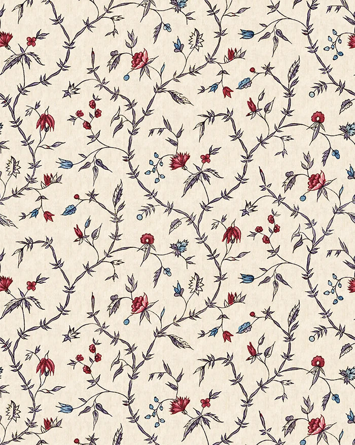 A repeating floral pattern fabric on a warm cream background, featuring delicate dark gray vines with small red and blue blossoms and leaves. Callista Home
