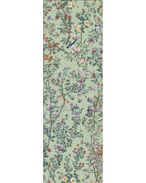 A vertical rectangular panel showing a dense botanical and bird pattern on a pale sage green background, with flowers, leaves, and small birds in pink, purple, blue, red, and green tones. Callista Home