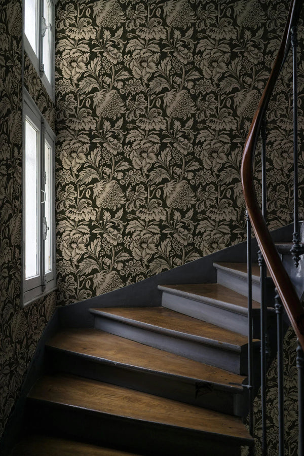 Staircase with ornate wallpaper featuring a floral pattern. Grands Pavots Wallpaper 59C by Antoinette Poisson featuring a large-scale French floral pattern inspired by historic 18th-century domino papers. Callista Home