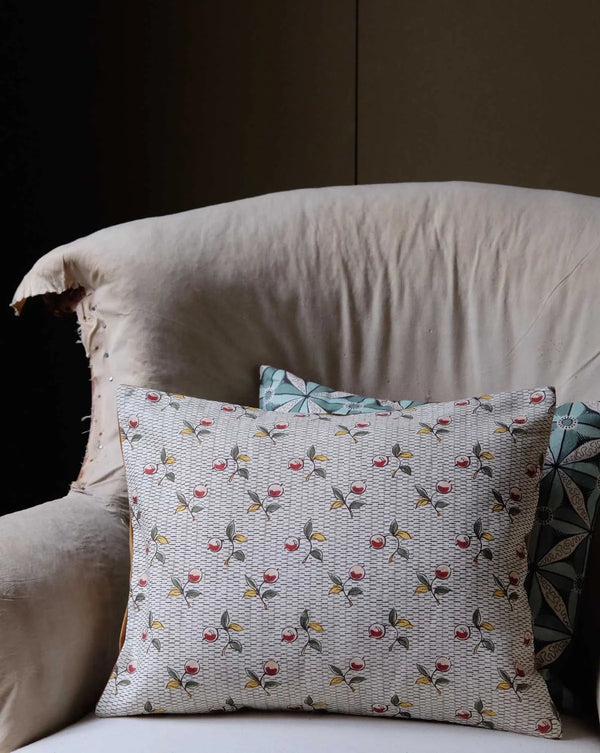 Decorative pillow with bird pattern on a sofa Baies 56A botanical berry French linen fabric by Antoinette Poisson Callista Home