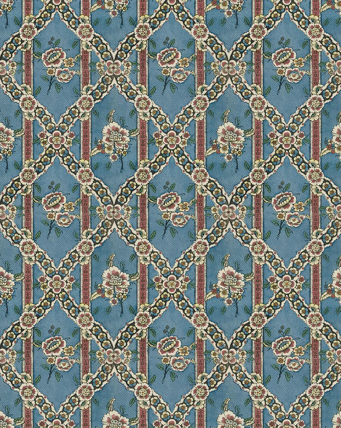 A close-up of a repeating fabric or wallpaper pattern featuring a blue background with a diamond lattice design, cream floral motifs, and vertical rust-red stripes. Guirlandes de Fleurs 1A blue floral French wallpaper  Callista Home