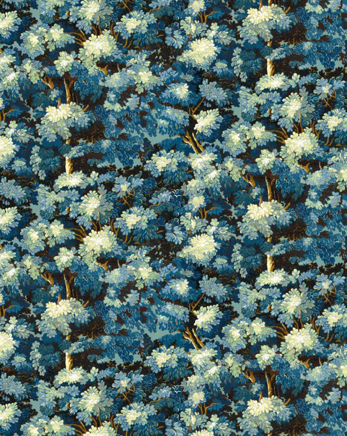 A close-up repeating pattern of dense blue and white flowering branches or foliage, filling the entire frame. Joli Bois 61 woodland botanical French wallpaper Callista Home