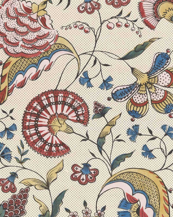 A close-up of a repeating textile or wallpaper pattern on a warm cream background, featuring stylized floral and paisley motifs in red, blue, mustard yellow, and green with a fine black dotted ground. Callista Home