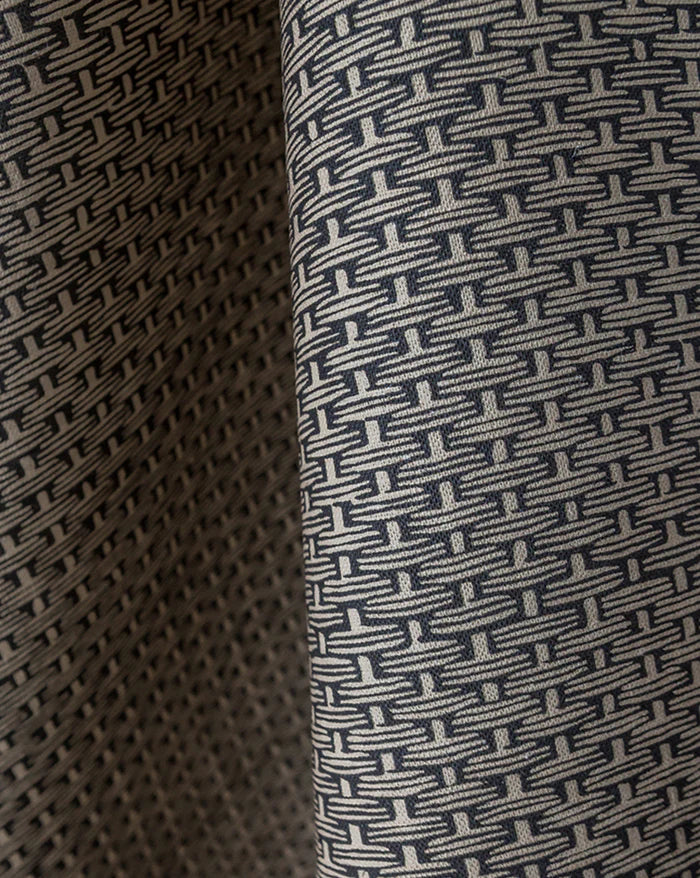 Close-up of textured fabric with a geometric pattern Osier 18B geometric French linen fabric by Antoinette Poisson Callista Home