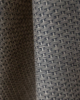 Close-up of textured fabric with a geometric pattern Osier 18B geometric French linen fabric by Antoinette Poisson Callista Home