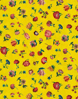 A close-up of a yellow fabric or wallpaper pattern featuring a scattered print of pink, red, and blue flowers with green stems and leaves. Bien Aimée botanical floral French linen fabric Callista Home